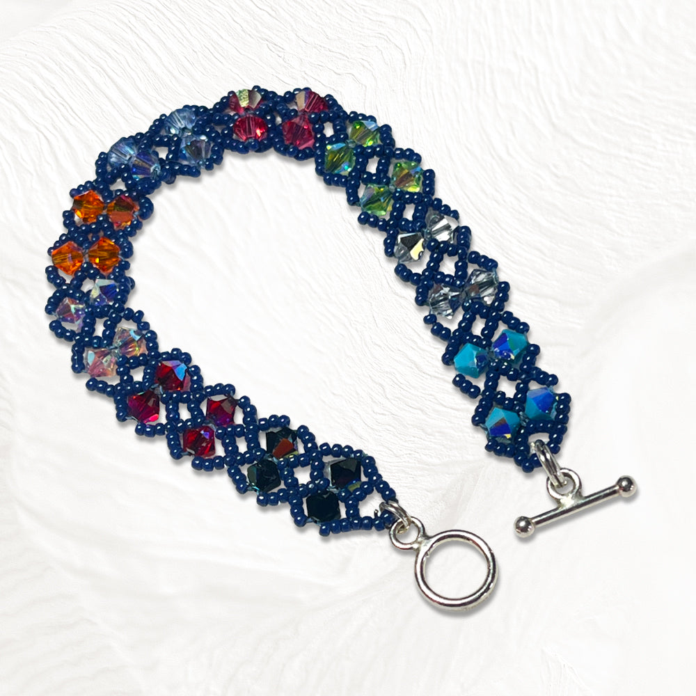 Bracelet Iris artisanal en perles Miyuki bleu nuit et cristaux Swarovski coloré, fermoir argent 925